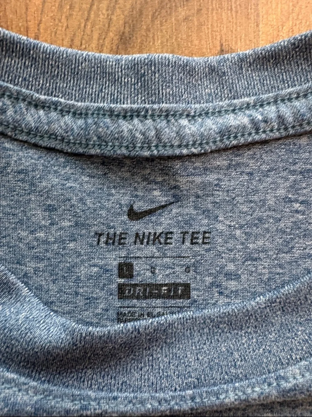 Nike Woman’s Gray/Blue Heather Performance Tee with White Swoosh